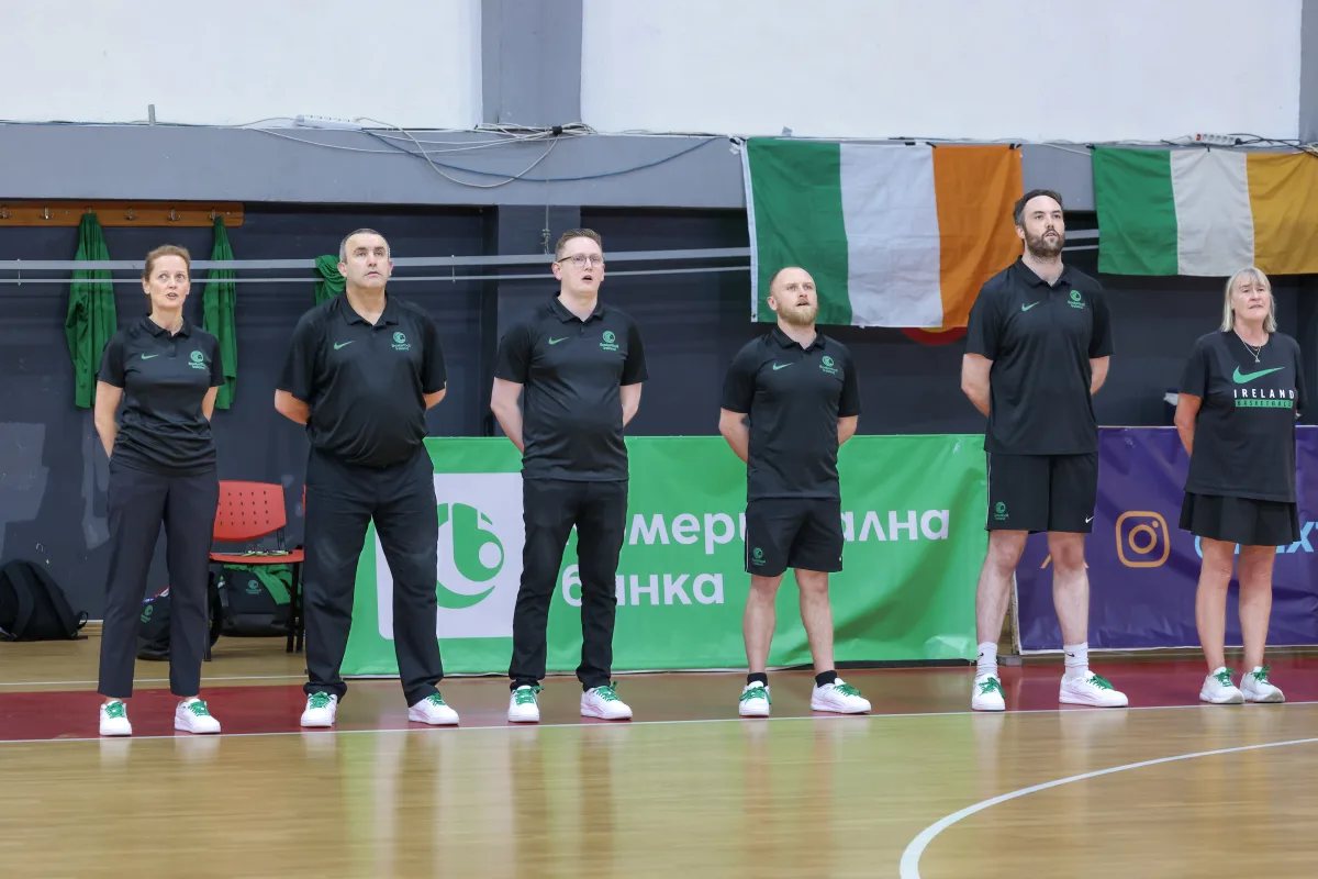 The Ireland U16 staff lined up under the tricolours
