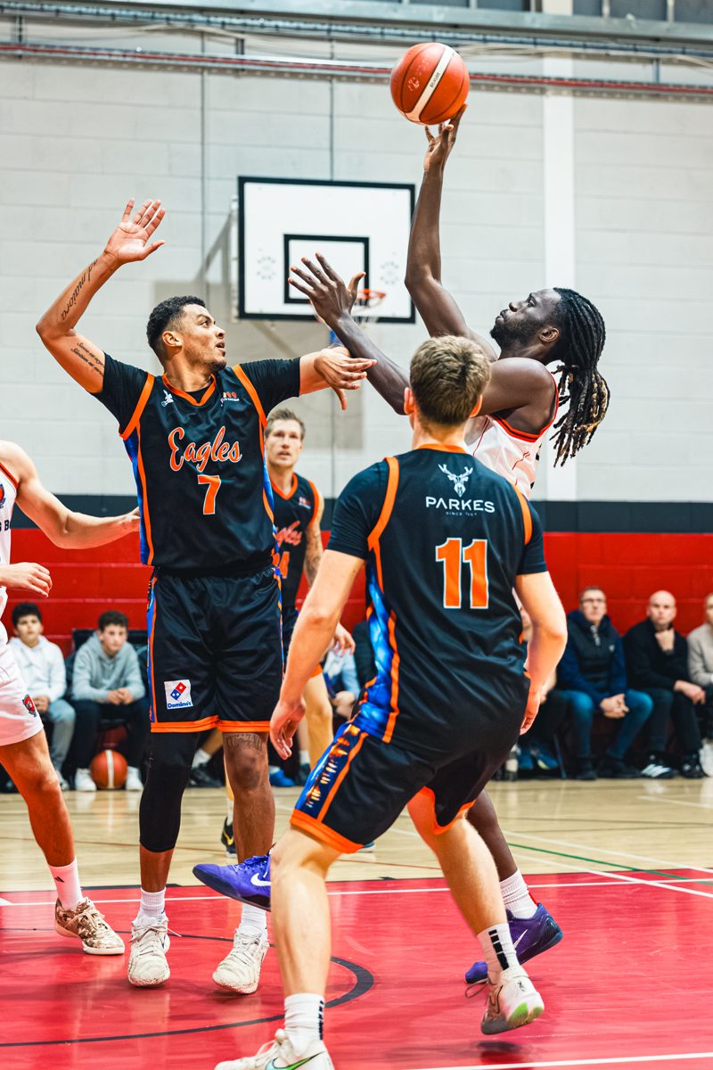 Ryan Leonard shoots over a Ballincollig defender