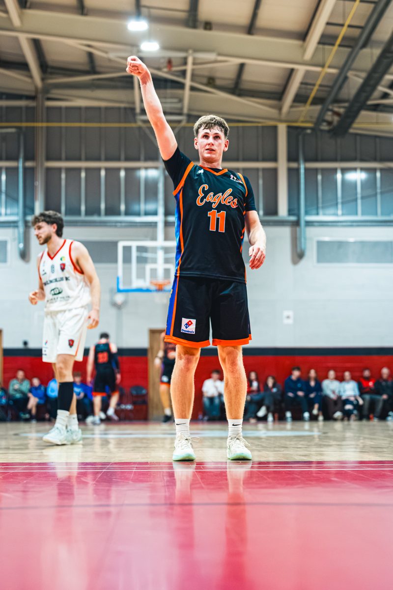 Darragh Horkan with his arm raised after a shot